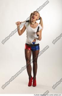 NIKOL WITH BASEBALL BAT AND GUN